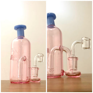 Pulsar Glass - 5.5" Bottle Rig w/ Banger - Pink & Purple - $90